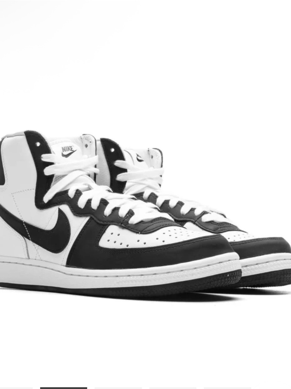 Nike Woman’s 9 or 7.5 men’s High-Top Sneakers in Black and White